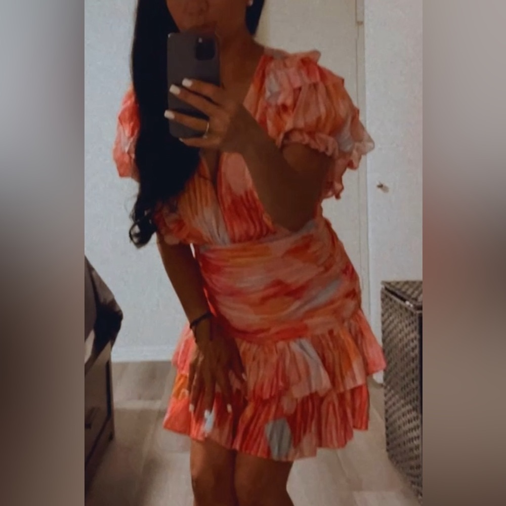 Hot pink floral mini dress perfect for a salsa-merengue night out in Miami.